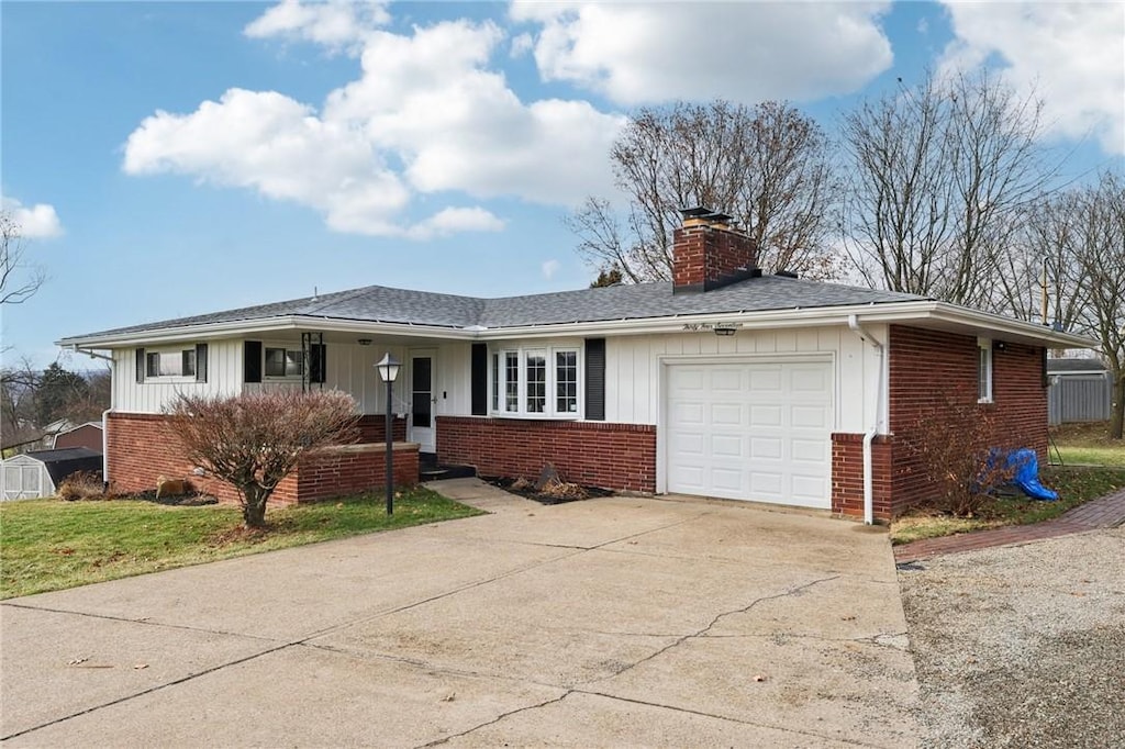 single story home featuring a garage