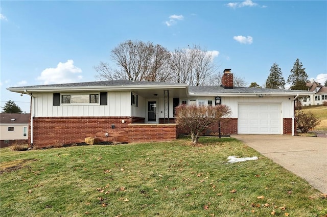 ranch-style house featuring a garage and a front lawn