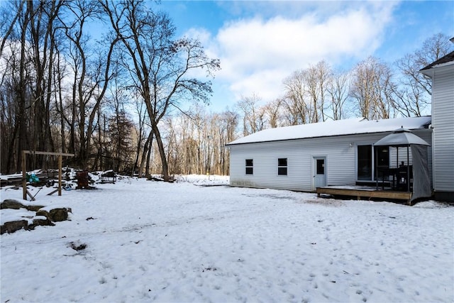 view of snow covered house