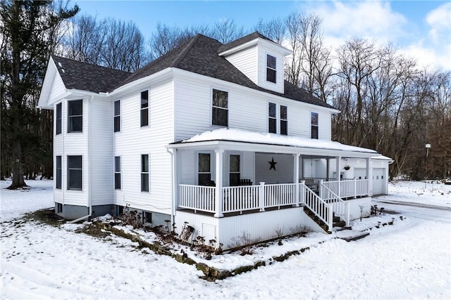 view of front of property featuring covered porch