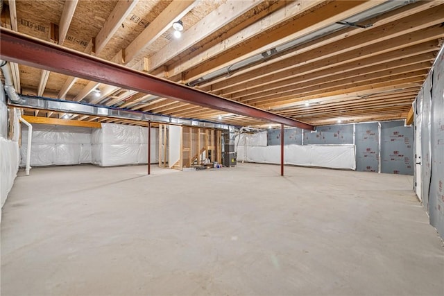 unfinished basement with heating unit