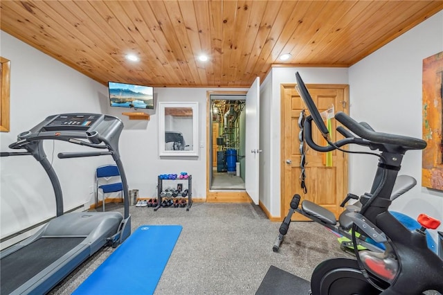 workout room featuring carpet floors, wooden ceiling, baseboards, and recessed lighting