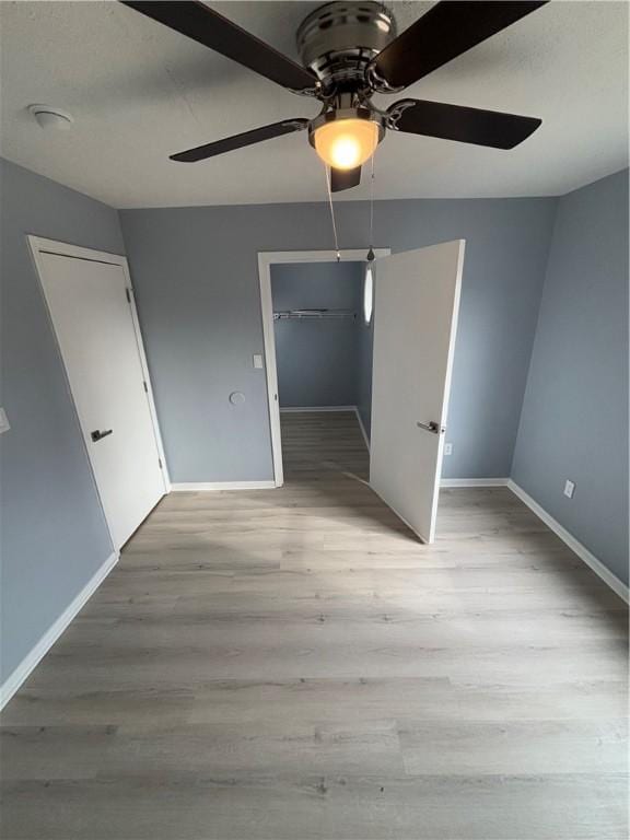 interior space featuring ceiling fan and light hardwood / wood-style floors