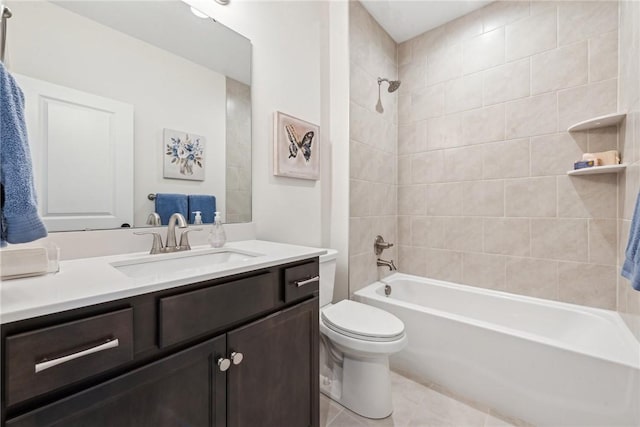 bathroom featuring shower / washtub combination, tile patterned flooring, vanity, and toilet