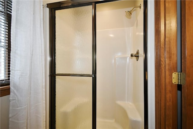 bathroom featuring walk in shower