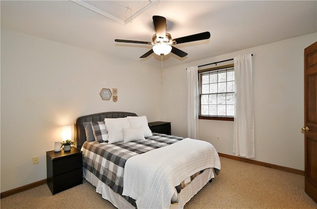 bedroom featuring light colored carpet and ceiling fan