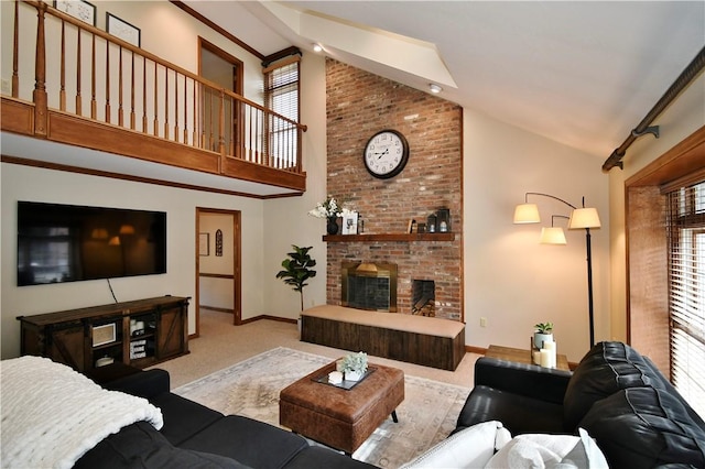 carpeted living room with a fireplace and high vaulted ceiling