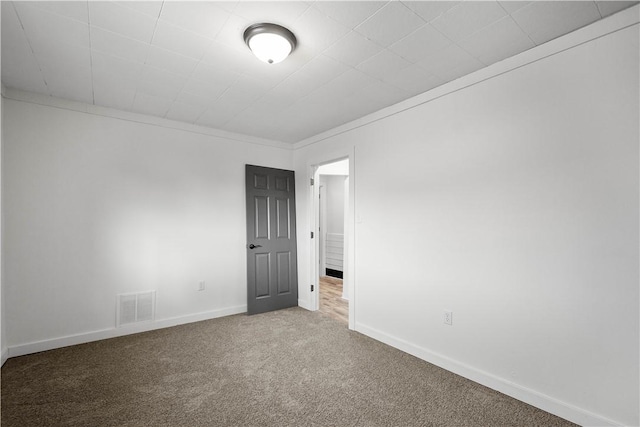 spare room with carpet flooring