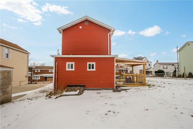 view of snow covered house