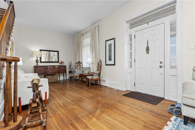 2515 Middle Rd, Hampton, PA 15116 - entrance foyer with light wood-style flooring and a baseboard heating unit