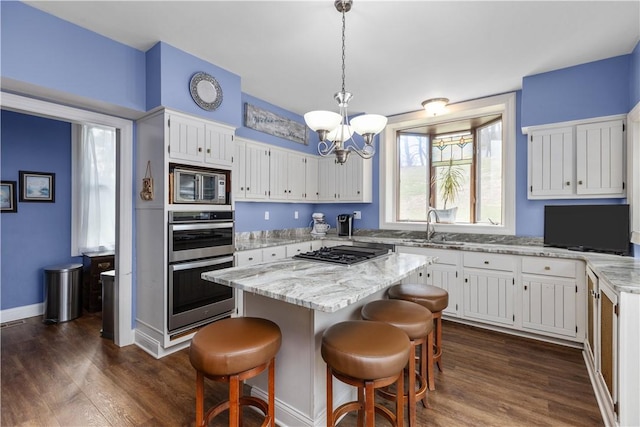 2515 Middle Rd, Hampton, PA 15116 - kitchen with appliances with stainless steel finishes, dark wood-style floors, a chandelier, and a sink