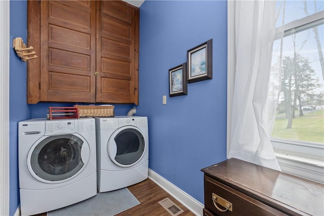 2515 Middle Rd, Hampton, PA 15116 - laundry room featuring cabinet space, separate washer and dryer, dark wood-style flooring, and baseboards
