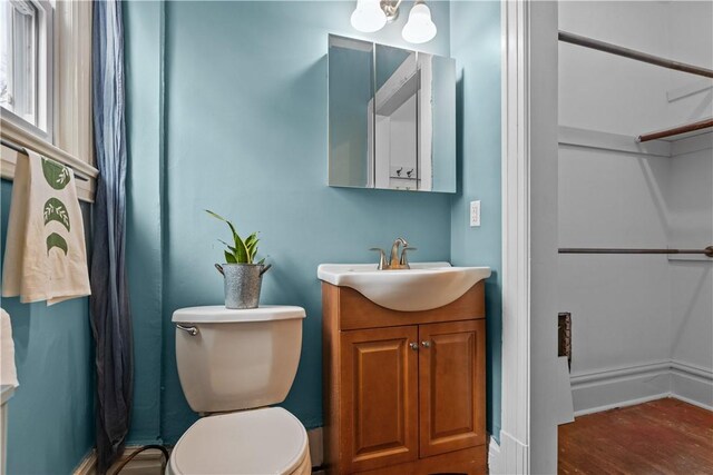 2515 Middle Rd, Hampton, PA 15116 - bathroom featuring wood finished floors, vanity, and toilet