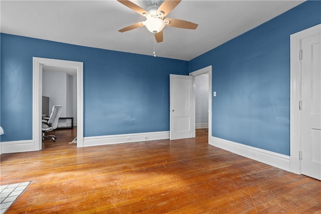 2515 Middle Rd, Hampton, PA 15116 - unfurnished bedroom with baseboards, wood finished floors, a desk, and ceiling fan