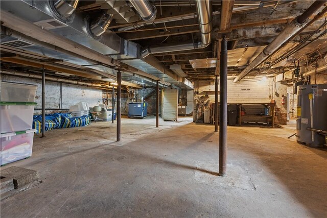 2515 Middle Rd, Hampton, PA 15116 - unfinished basement featuring electric water heater and heating unit