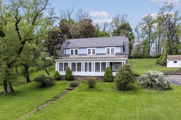 2515 Middle Rd, Hampton, PA 15116 - view of front of house featuring a chimney and a front lawn