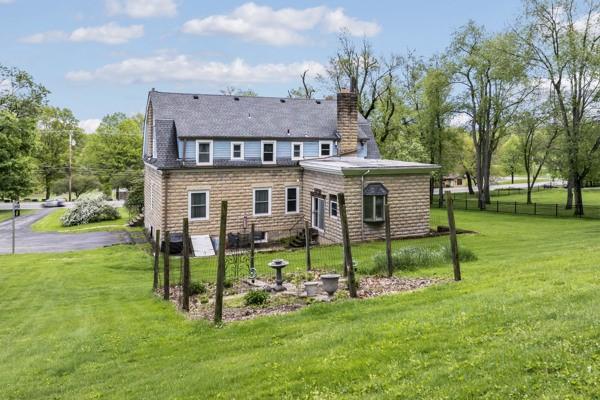 2515 Middle Rd, Hampton, PA 15116 - rear view of house featuring a chimney