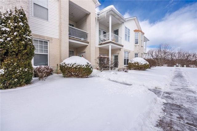 view of snow covered property