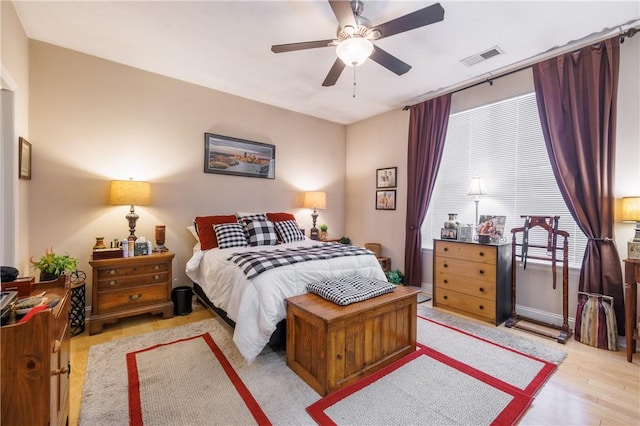 bedroom featuring ceiling fan and light wood-type flooring