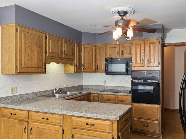 kitchen with tasteful backsplash, sink, ceiling fan, and black appliances