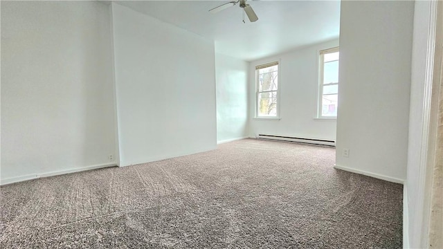 unfurnished room featuring ceiling fan, carpet flooring, and baseboard heating