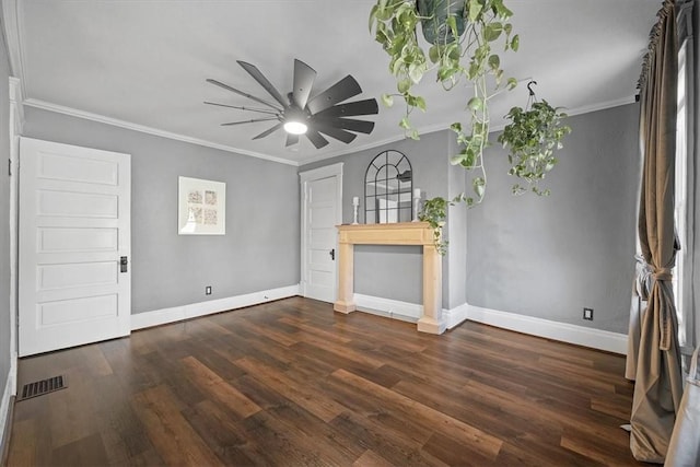 unfurnished living room with dark hardwood / wood-style flooring, ornamental molding, and ceiling fan