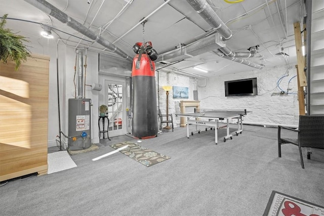 interior space with water heater and carpet