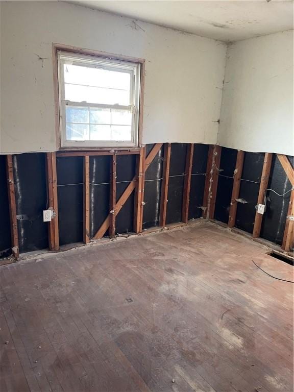 miscellaneous room featuring hardwood / wood-style flooring