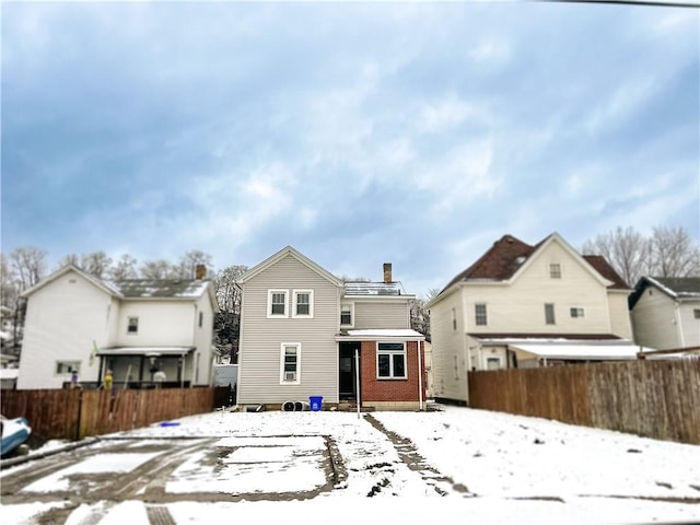 view of snow covered property