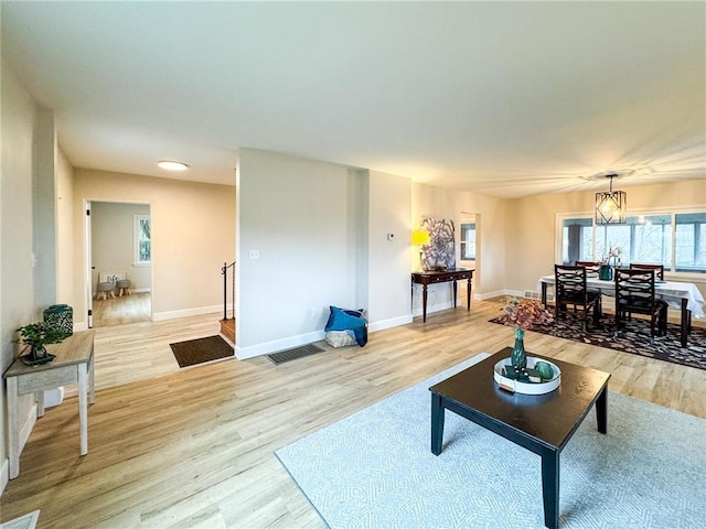 living room with light hardwood / wood-style floors