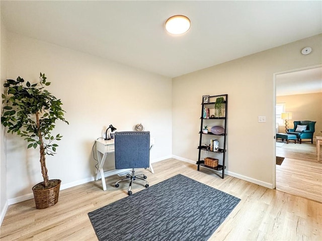 home office featuring light hardwood / wood-style flooring