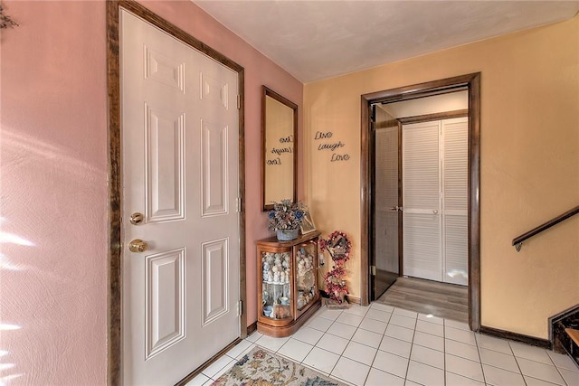 view of tiled foyer entrance