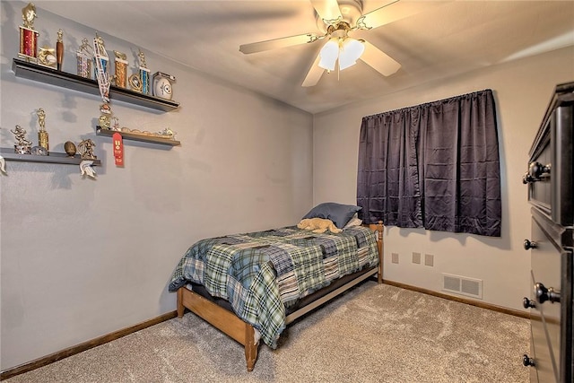 carpeted bedroom with ceiling fan