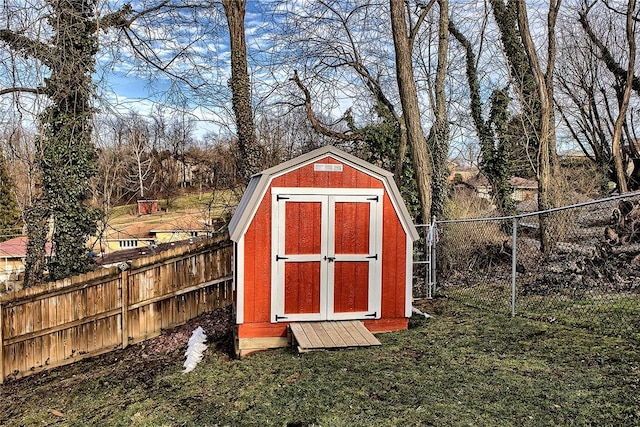 view of outbuilding featuring a lawn