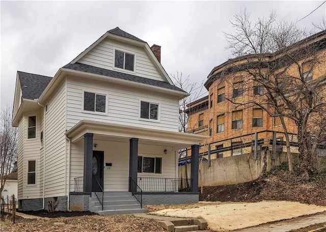 view of front of property featuring covered porch