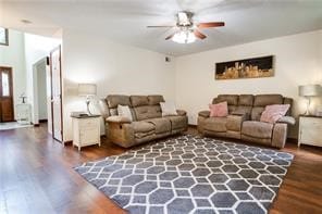 living room with ceiling fan and wood-type flooring