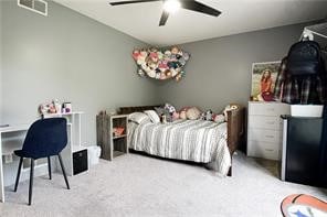 carpeted bedroom with ceiling fan