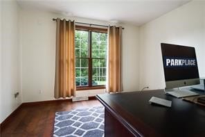 office area with dark hardwood / wood-style floors