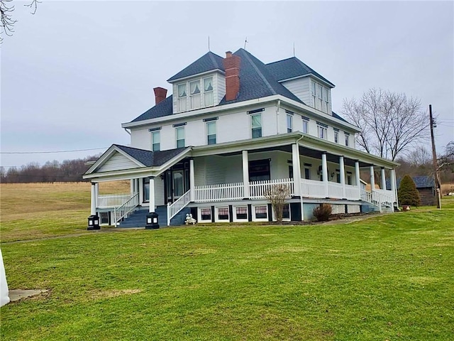 exterior space with a porch and a front lawn