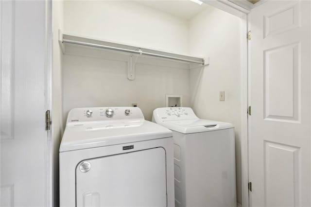 laundry room featuring independent washer and dryer