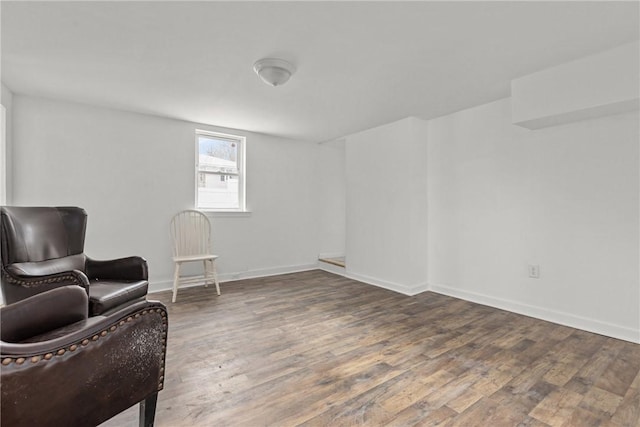 living area with dark hardwood / wood-style floors