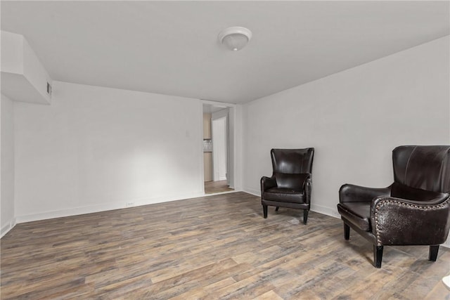 living area featuring hardwood / wood-style flooring