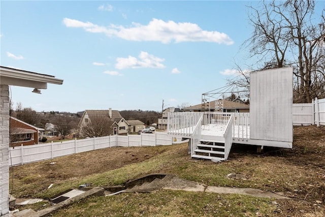 view of yard with a wooden deck