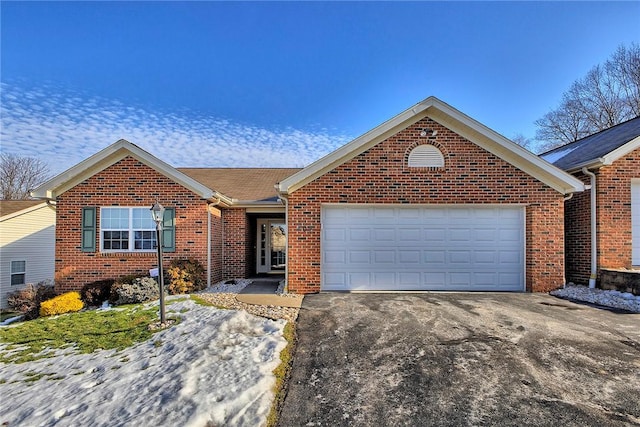 single story home with a garage