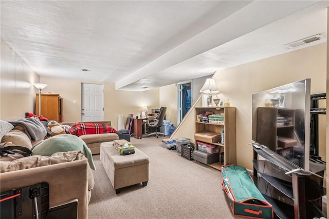 living room featuring carpet flooring and visible vents