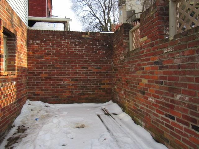 view of snow covered patio