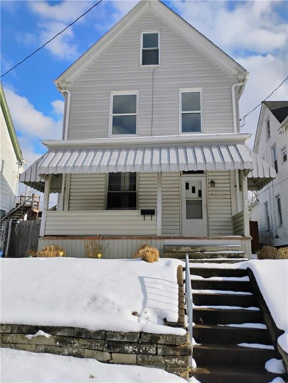 view of front of home featuring covered porch