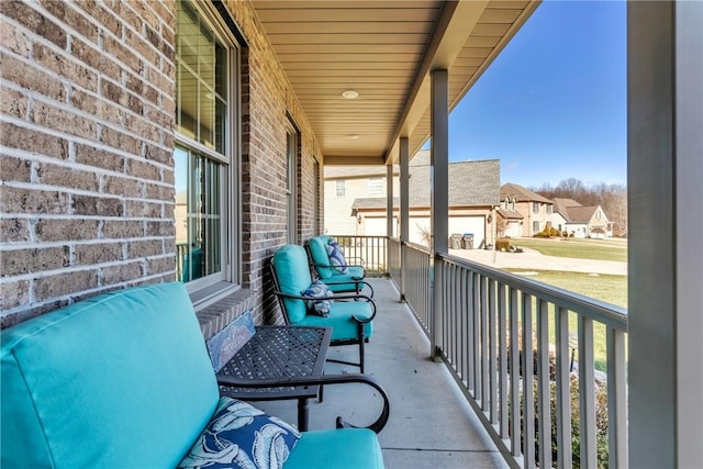 balcony featuring a porch