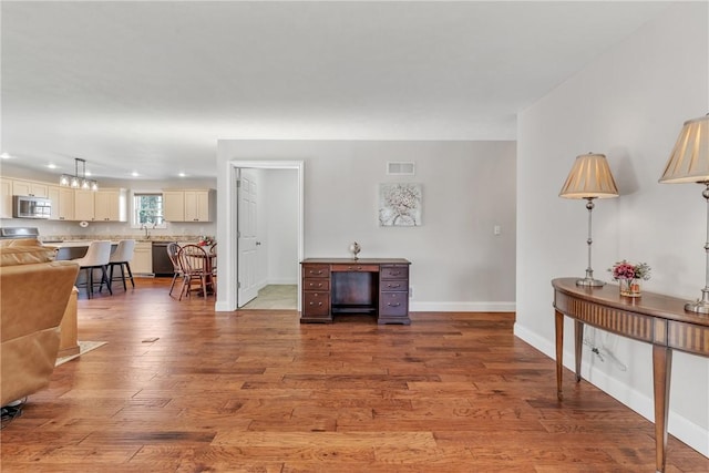 living room with wood-type flooring