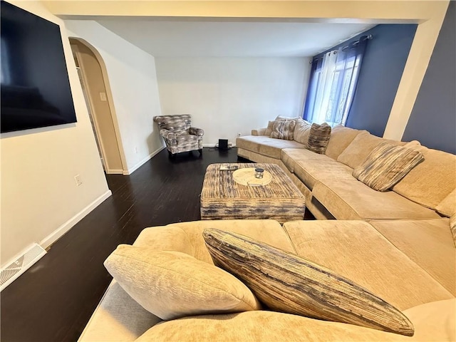 living room featuring dark hardwood / wood-style flooring